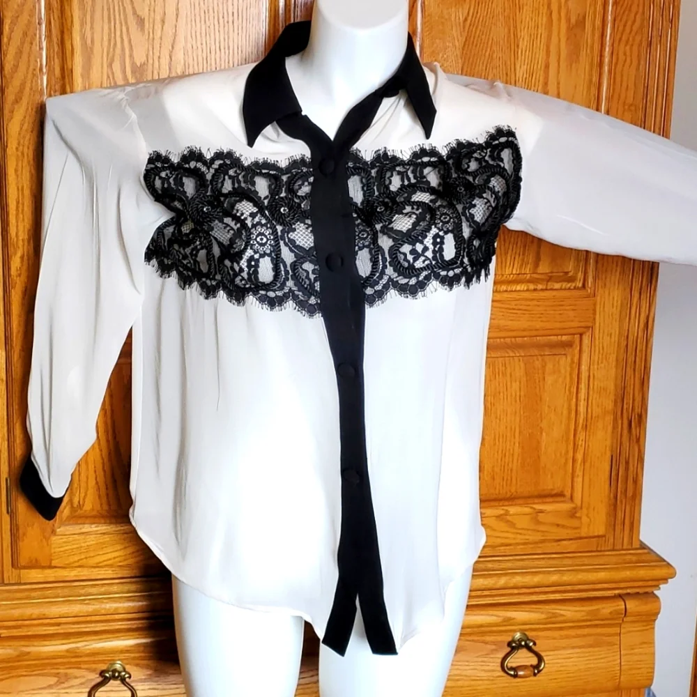 Beautiful ivory sheer blouse with decorative black lace. - Picture 1 of 7